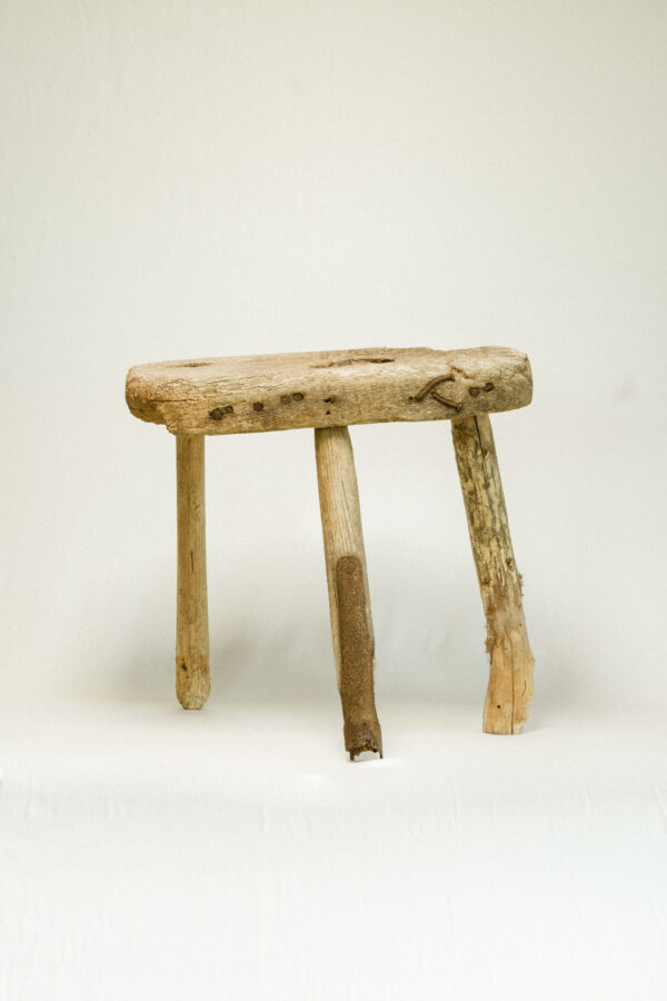 wooden stool against white background